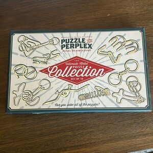 NIB Metal Puzzles Set of 10.